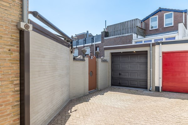 Foto - Verkocht onder voorbehoud: Nette twee- onder- een – kapwoning met serre, zonnige tuin en garage in Bocholtz
